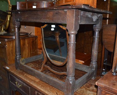 Lot 645 - An early 18th century joined oak table, 100cm wide