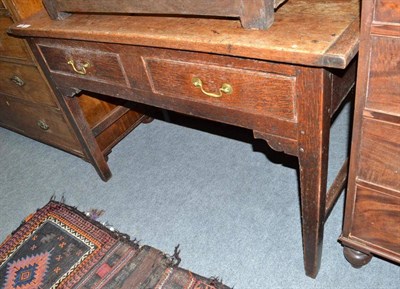 Lot 646 - An 18th century joined oak table with two drawers, 126cm wide