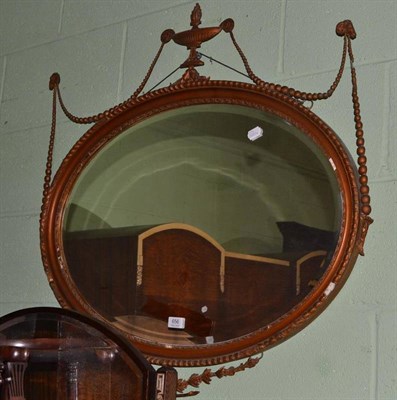 Lot 656 - An Adams style oval gilt wall mirror, 89cm wide