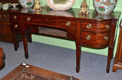 Lot 674 - A George IV mahogany and ebony strung breakfront sideboard