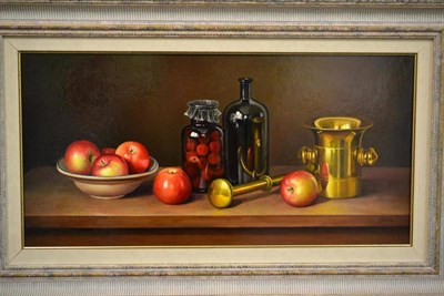 Lot 1077 - Andras Gombar (b.1946) Still life with apples Signed, oil on board, 28.5cm by 58.5cm