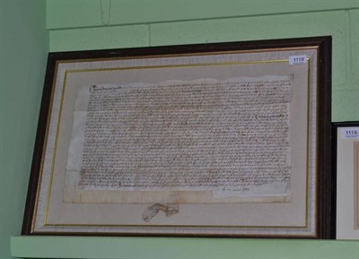 Lot 1118 - A manuscript indenture circa 1554-8, framed and glazed