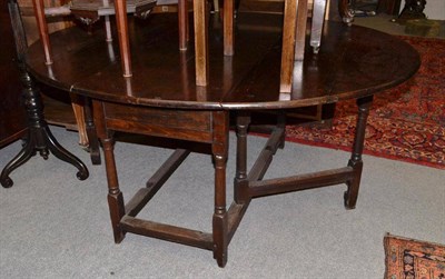 Lot 1251 - Oak gate leg table