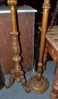 Lot 1262 - Two giltwood standard lamps