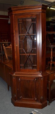 Lot 1265 - A reproduction mahogany standing corner cupboard