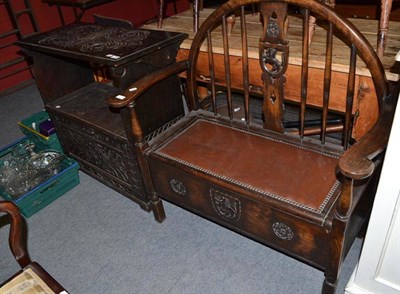 Lot 1269 - A carved oak monk's bench and a hall bench