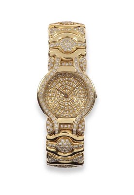 Lot 228 - A Lady's 18ct Gold Diamond Set Wristwatch, signed Bulgari, circa 1995, quartz movement, diamond set
