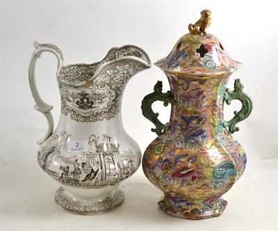 Lot 2 - A 19th century ironstone chinoiserie pot pourri vase and cover and a Bell pottery printed water jug