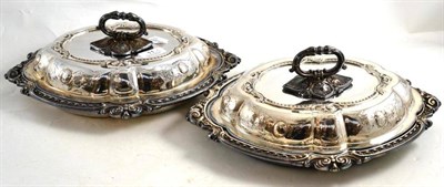 Lot 11 - A pair of oval plated entree dishes and covers