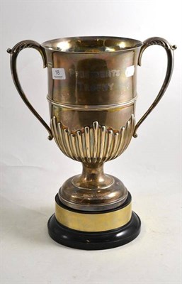 Lot 18 - A large silver two handled President's Trophy cup on socle
