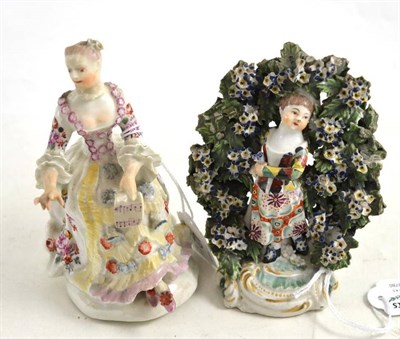 Lot 42 - A Derby porcelain figure of a lady, circa 1756, seated wearing flowing robes holding a letter...