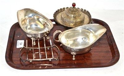 Lot 54 - A pair of silver sauce boats, silver toast rack and an Indian box and cover