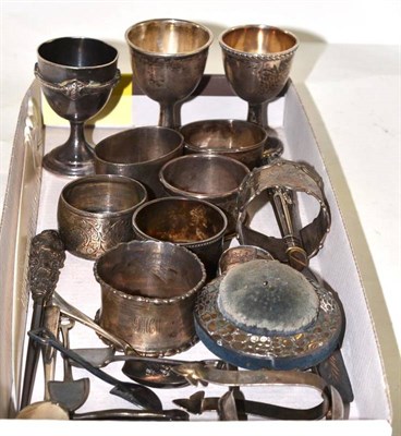 Lot 73 - A box of small silver including napkin rings, egg cups etc