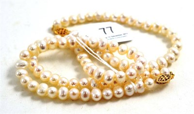 Lot 77 - A Baroque pearl necklace and bracelet