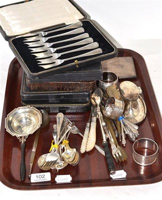 Lot 102 - A collection of silver flatware including assorted teaspoons, silver mounted flatware,...