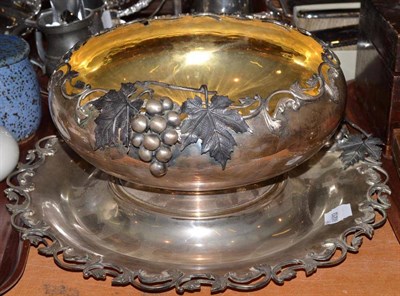 Lot 115 - A white coloured metal punch bowl and stand