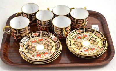 Lot 120 - A set of six Royal Crown Derby coffee cups and saucers