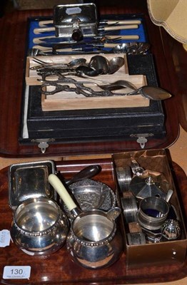 Lot 130 - A quantity of silver plated items including Danish style milk and sugar, dishes, napkin rings,...