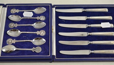Lot 142 - Cased set of six silver spoons and six silver handled knives