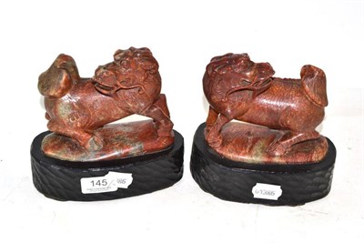 Lot 145 - Pair of marble dog figures