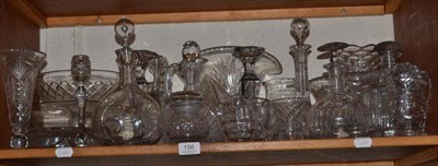 Lot 156 - A shelf of cut glass and crystal including various decanters etc