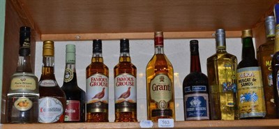 Lot 163 - A Christmas parcel of spirits including two bottles of Grouse whisky and a litre of Grants whisky