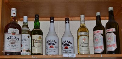Lot 164 - A Christmas parcel of spirits including litres of Malibu, Bacardi, whisky and bourbon