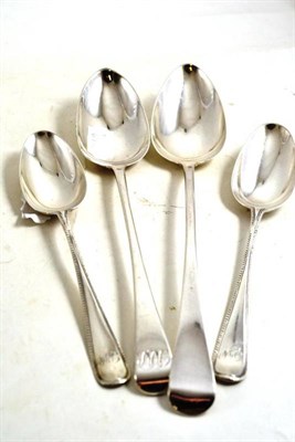 Lot 173 - A pair of bead pattern tablespoons and two Georgian silver basting spoons (4)