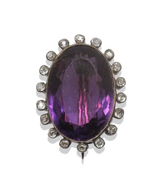 Lot 250 - An Amethyst and Diamond Brooch, circa 1880, the oval cut amethyst within a spaced border of old cut