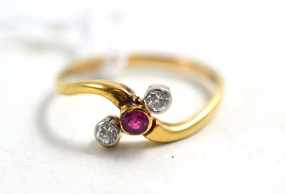 Lot 192 - A ruby and diamond three stone twist ring