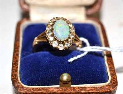 Lot 193 - An opal and diamond ring, stamped '18CT'