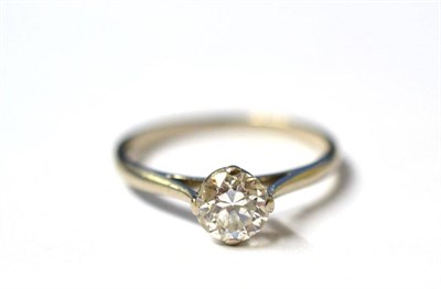 Lot 252 - A Diamond Solitaire Ring, the old brilliant cut diamond in a white four claw setting, to a...