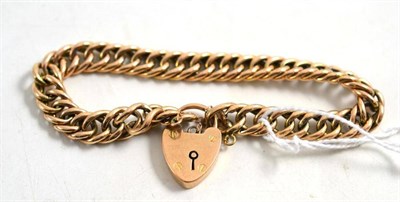 Lot 198 - Double curb and lock bracelet, padlock hallmarked 9ct gold