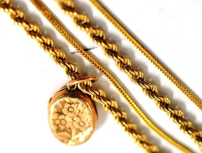 Lot 201 - A 9ct gold foxtail necklace, a 9ct gold rope twist necklace and a locket