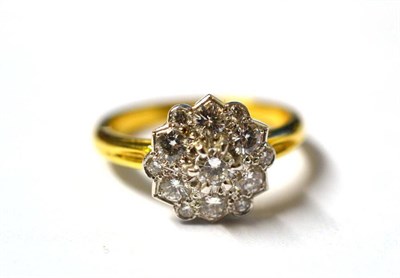 Lot 254 - A Diamond Cluster Ring, the round brilliant cut diamonds in white claw and collet settings, to...