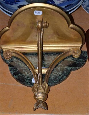 Lot 226 - A 19th century giltwood and gesso wall bracket with verde antico marble top