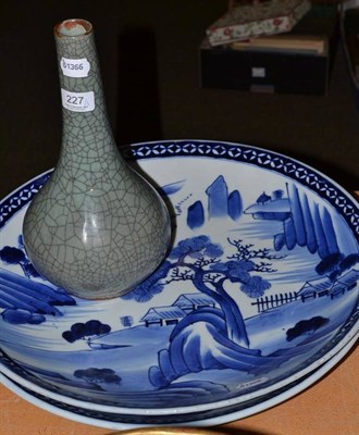 Lot 227 - Two 20th century Japanese blue and white porcelain chargers and a Chinese crackle glaze vase,...