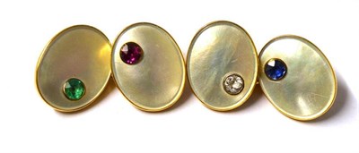 Lot 255 - A Pair of Cufflinks, oval mother-of-pearl panels each inset with a gemstone; a ruby, an...
