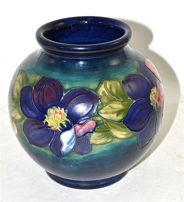 Lot 229 - A Walter Moorcroft clematis pattern vase