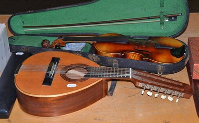 Lot 231 - A cased violin, a mandolin and a flute (3)