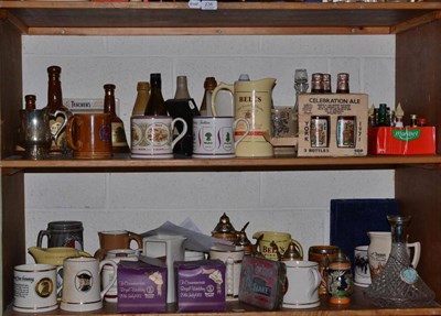 Lot 237 - Two shelves including assorted whisky water jugs, advertising tankards etc