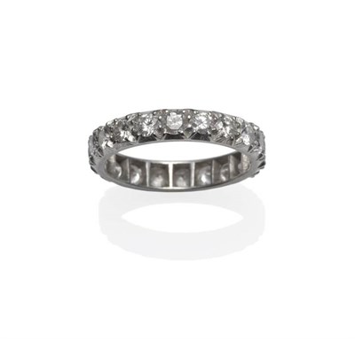 Lot 258 - A Diamond Eternity Ring, the round brilliant cut diamonds in white claw settings, total...