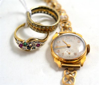 Lot 269 - A lady's wristwatch stamped '18K' on a 9ct gold bracelet, a 9ct gold multi gem dress ring and...