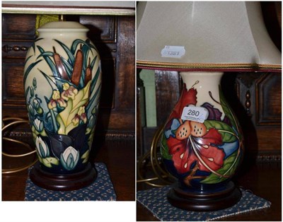 Lot 280 - A Moorcroft Lamia pattern table lamp with cream shade; and a Moorcroft Simeon pattern table...