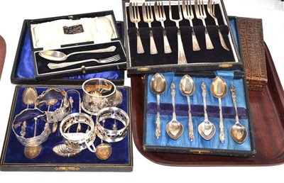 Lot 286 - Six silver apostle spoon with tongs, five napkin rings, Christening set and three boxes of...