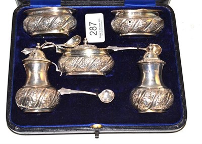 Lot 287 - A cased silver condiment set