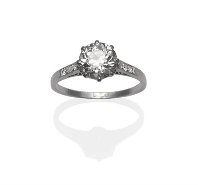 Lot 262 - A Diamond Solitaire Ring, circa 1930, the old brilliant cut diamond in a white eight claw...
