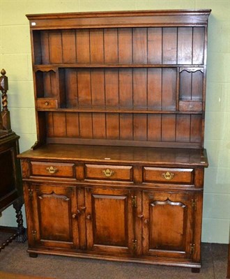 Lot 345 - A Titchmarsh and Goodwin oak dresser, 4ft x 6ft