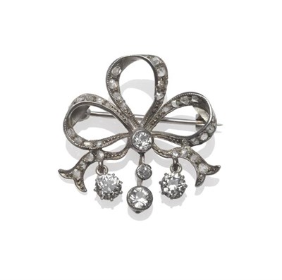 Lot 266 - A Late Victorian Bow Brooch, the bows three loops inset with rose cut diamonds, with three...