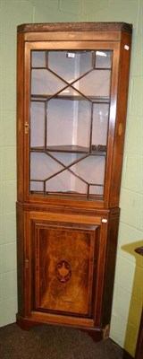 Lot 358 - A 19th century inlaid mahogany standing corner cupboard with glazed upper section